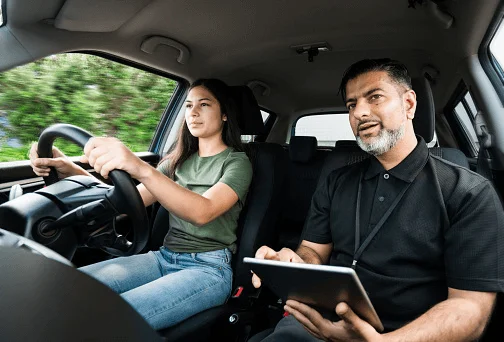 Driving Instructor Giving Instruction