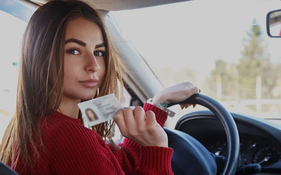Girl Showing her Driving Licence