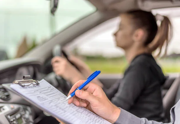 Driving Instructor Giving Instruction